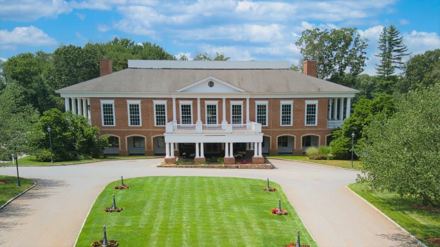 Country club with balcony and pillars 